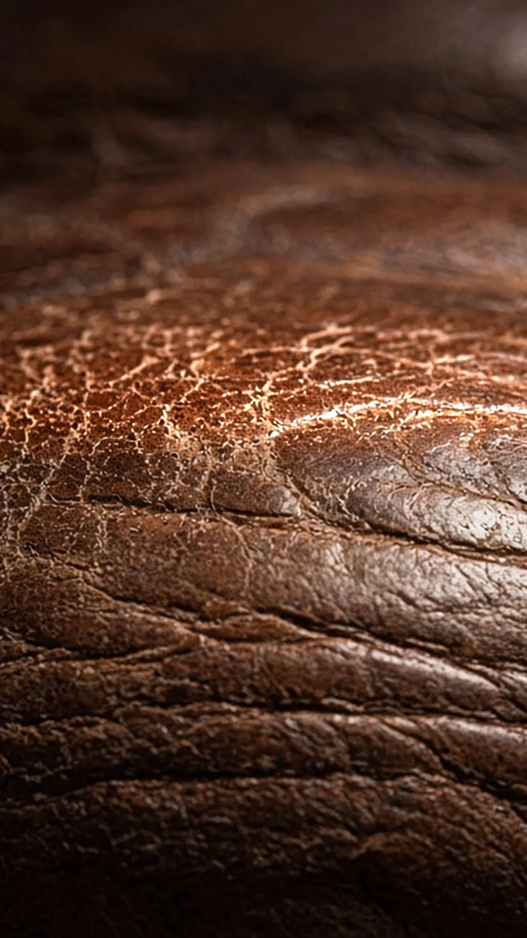 Close view of soft creases across a boot toe
